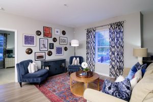 Madison Park Living Space with couch, chairs, and gallery wall 